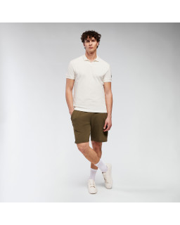 Biała koszulka polo Macron ATH Icon Radiant – premium styl i komfort